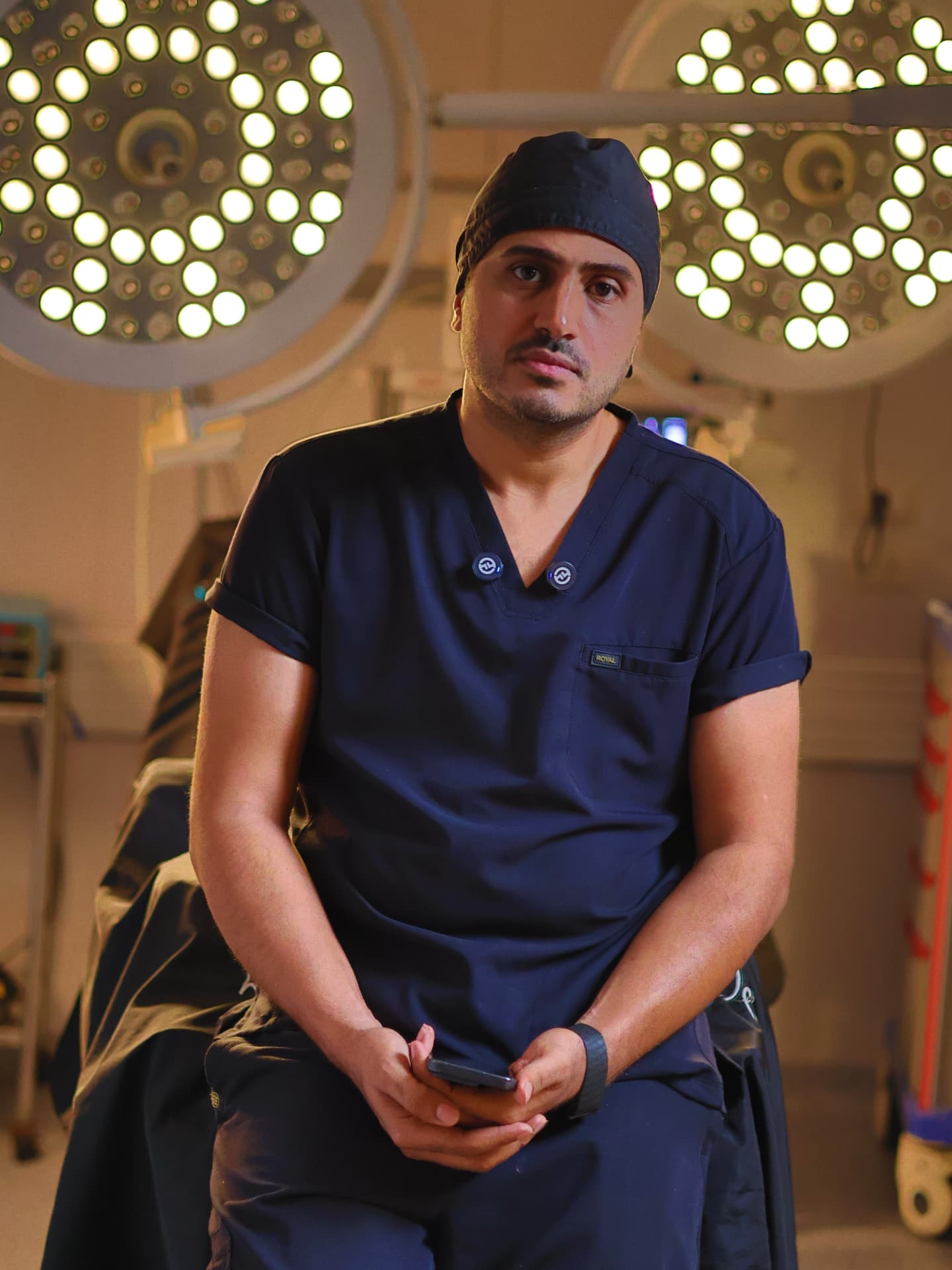 Dr. Mohamed Abdelhady in surgical scrubs